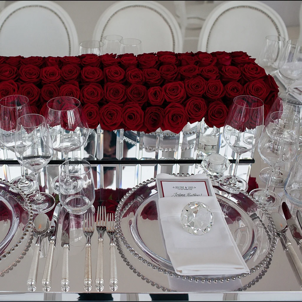 red roses on mirrors display