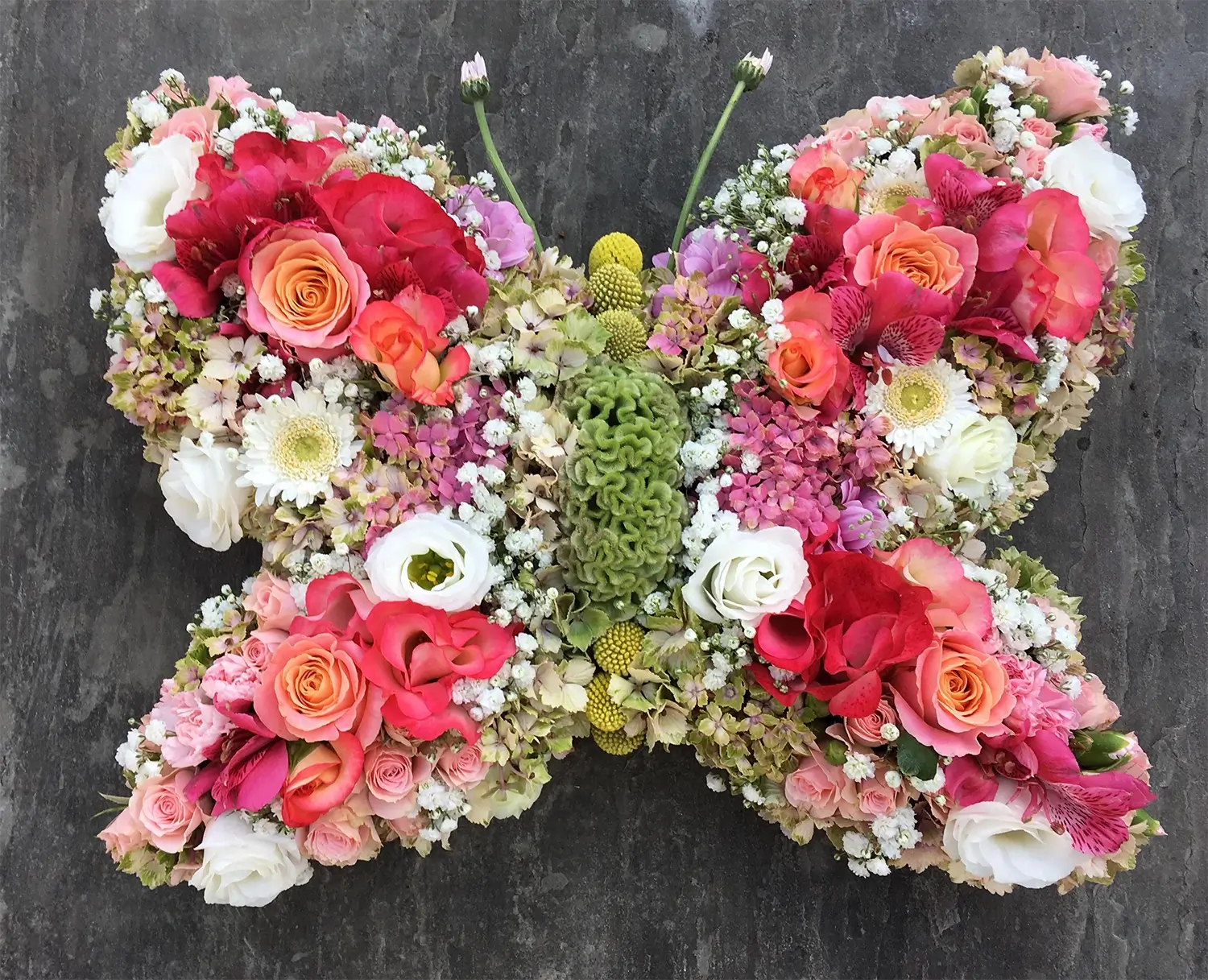 Funeral flowers in shape of a butterfly