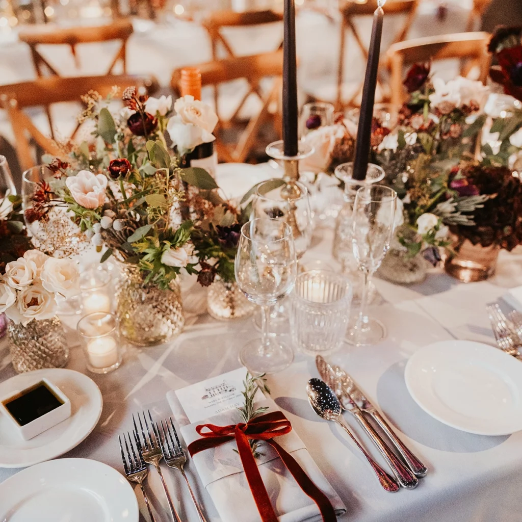 Red ribbon, red and white flowers