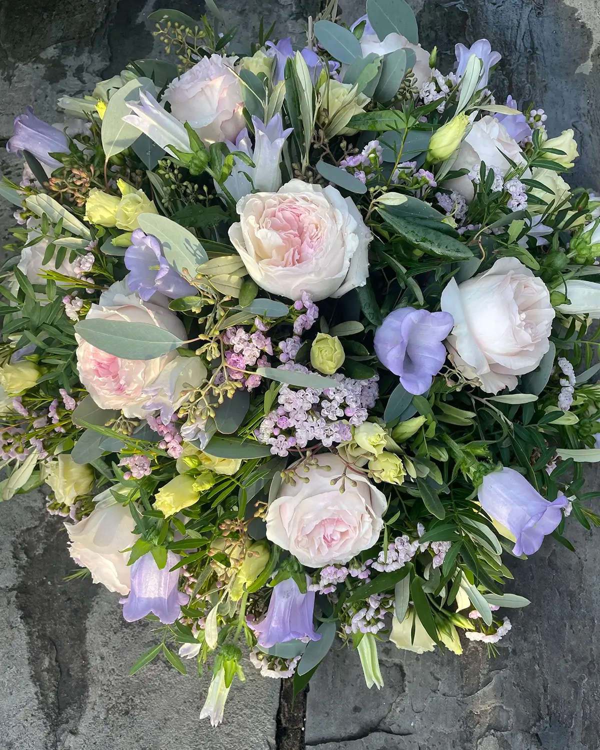 Funeral pastel flowers display