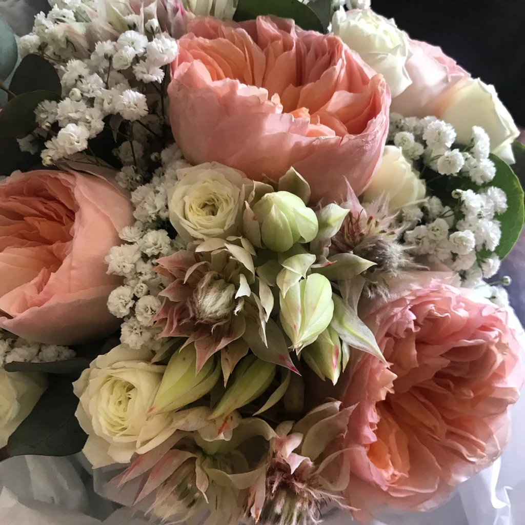 pink cream and white flower bouquet
