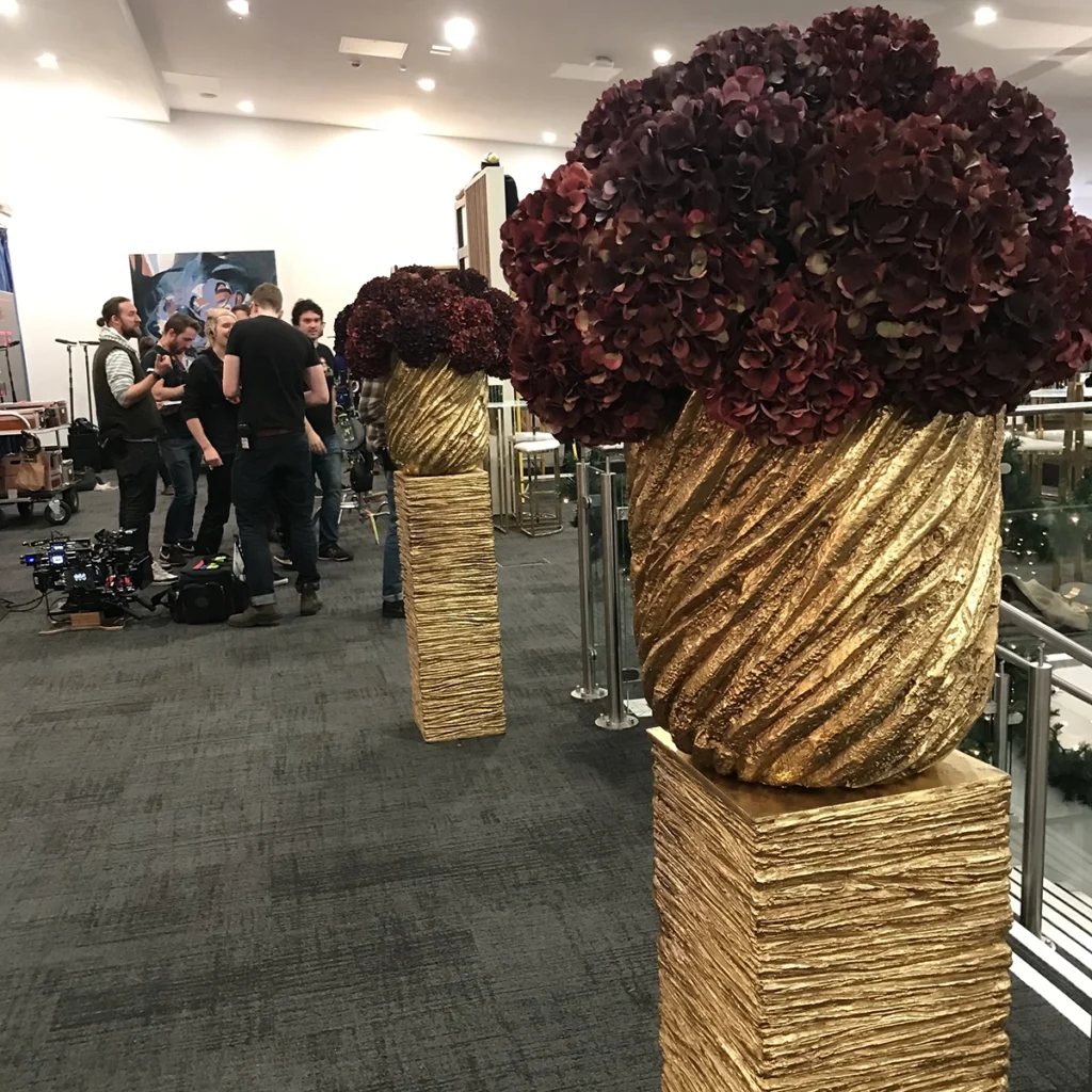 TV Large gold vase and pedestal burgundy flowers